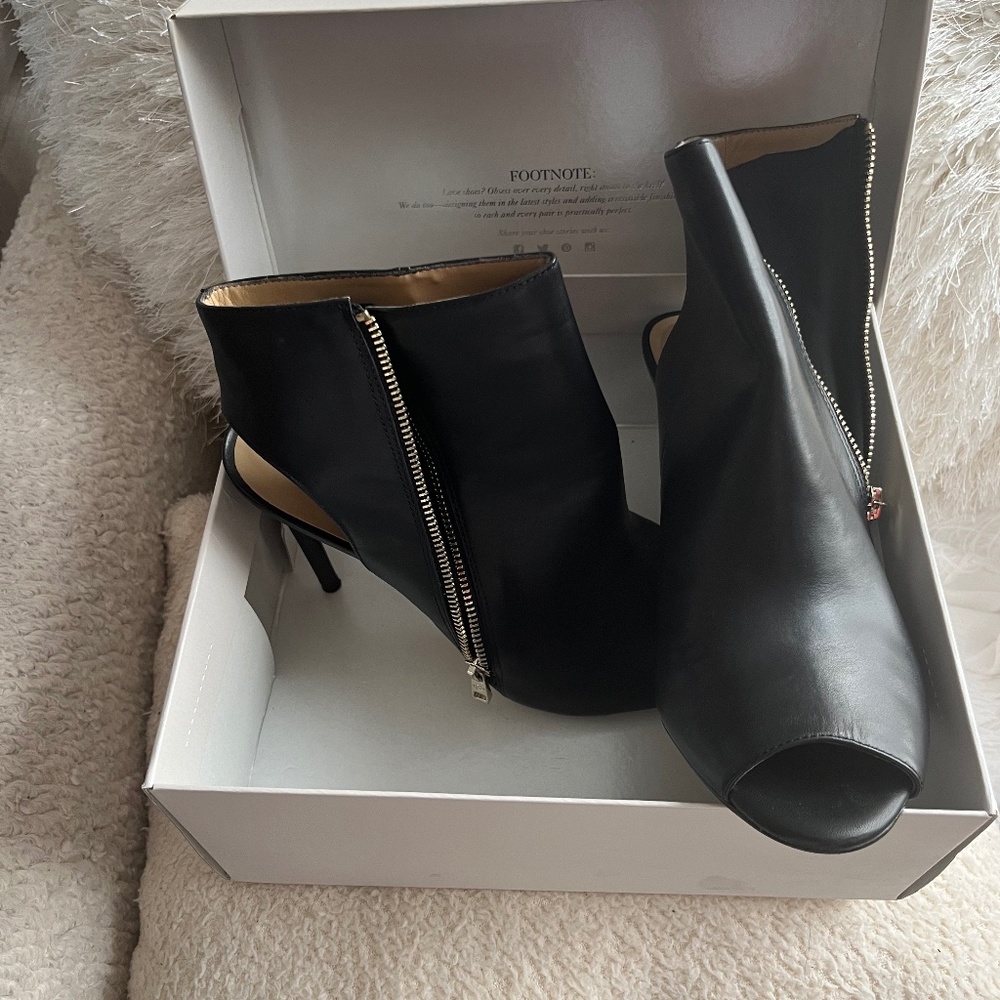 Pre-Loved Peep-Toe Heel Sandal; approx. 3 3/4 heel. Black w/gold zippered bling;